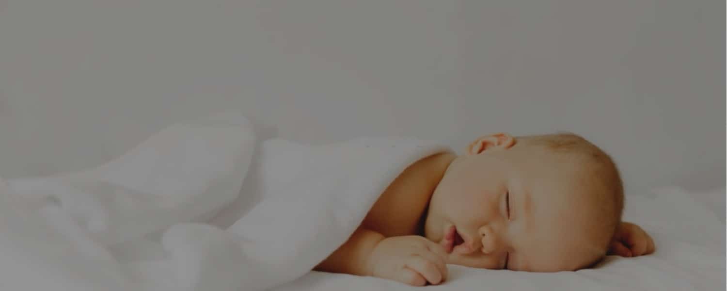 When Can Babies Sleep With Blankets? Swaddling 101